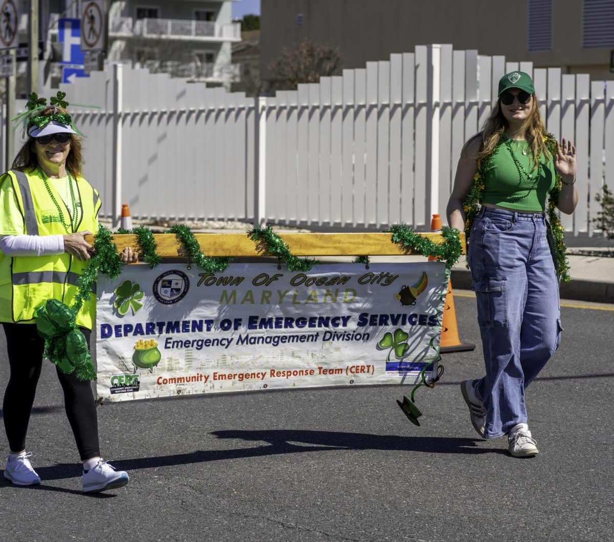 Department of Emergency Services Girls holding parade banner